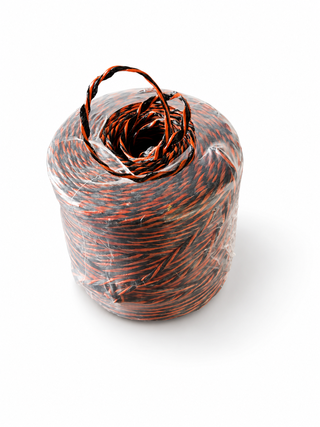 One ball of CWC black and orange polypropylene tree rope on white background