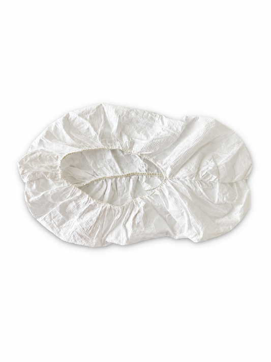 DuPont Tyvek 400 white shoe cover, detail view on white background