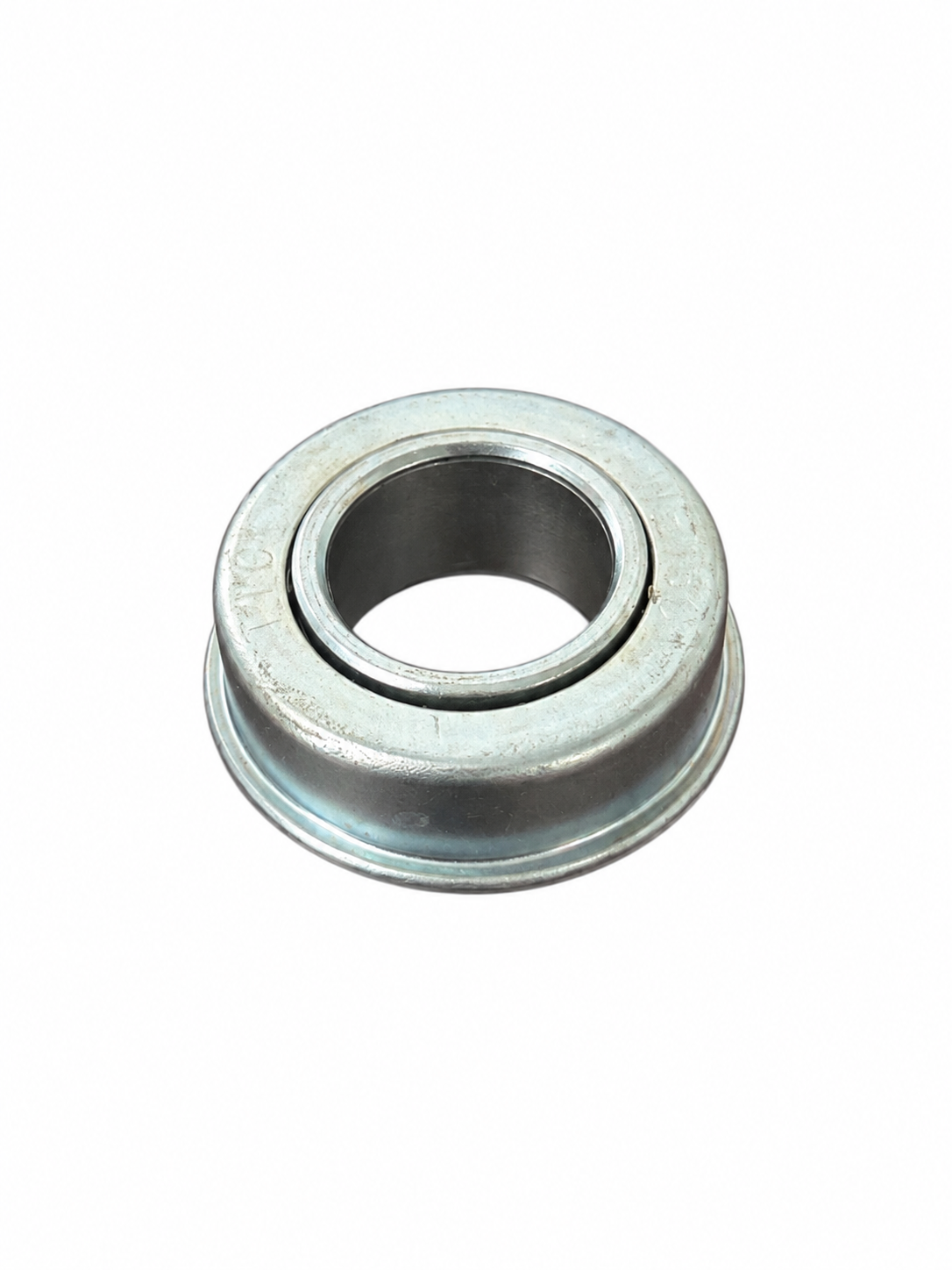 Reverse view of flanged wheelbarrow wheel bearing on white background