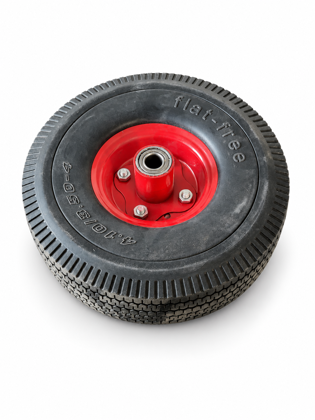 Angled view of one 4.10/3.50-4 flat-free wheel with red metal hub against white background