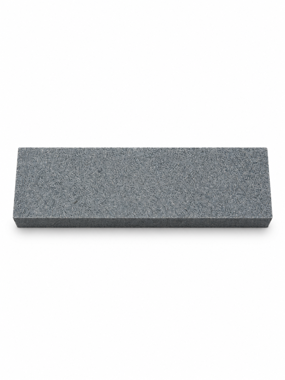 Compact gray sharpening stone, top view on white background