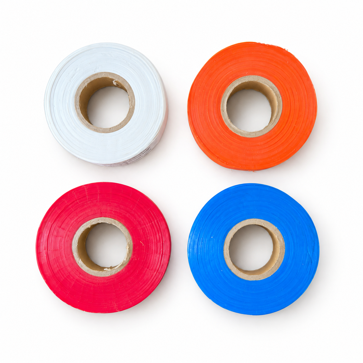 White, orange, red and blue vinyl flagging tape rolls, 1 inch by 300 feet